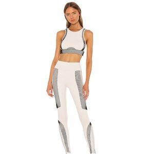 ALO Yoga Cream and Black Leggings